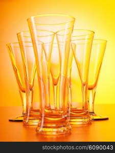 Wine glasses against gradient background