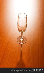 Wine glasses against wooden background