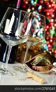 Wine glasses on Christmas tree background