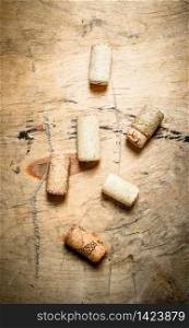 Wine group corks. On a wooden background.. Wine wooden corks.