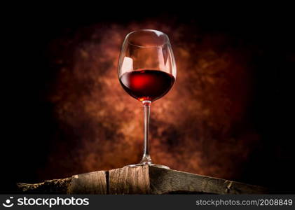 Wine in a glass on a wooden table