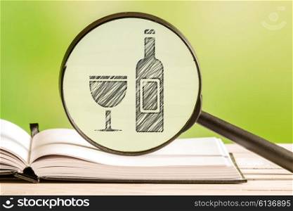 Wine information with a pencil drawing of a wine bottle and glass icon in a magnifying glass