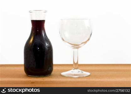 wine. photo of a bottle of red wine and a glass