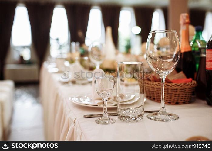 wine restaurant serving romance beautiful concept alcohol glass, holiday dinner in a cafe. Glass glasses on the table. Glass glasses on the table. wine restaurant serving romance beautiful concept alcohol glass, holiday dinner in a cafe