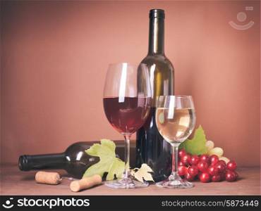 Wine still life with bottles, corks, grapes and glasses