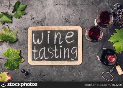Wine testing concept on dark background, copyspace, flat lay
