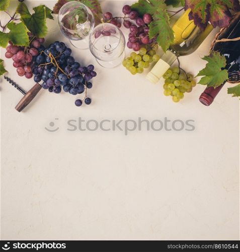 Wine with glasses, grapes, leaves and corkscrew on dark background, copyspace, flat lay. Wine composition on rustic background, flat lay, top view