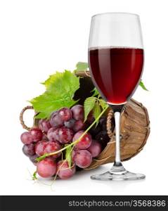 Wineglass and grapes in a wooden basket isolated on white background