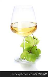 wineglass with white wine and grape over white