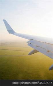 Wing of airplane from window