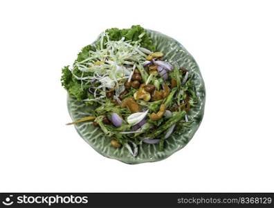 Wings Bean Spicy Salad  Yum-Tua-Phuu  on green ceramic isolated on white background with clipping path. Authentic thai food. Top view, Selective focus.