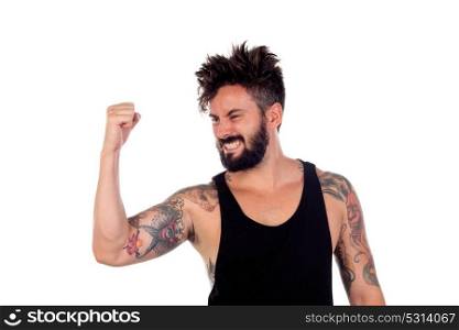 Winner handsome bearded man with tattoos on his body isolated on a white background