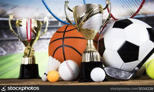 Winner trophy, Sport equipment and balls. Cups of winners award, Sport equipment and balls