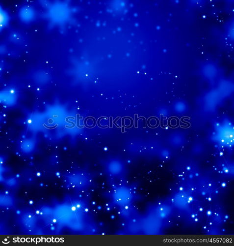 Winter background. Blue Christmas background with snowflakes and lights