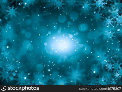 Winter background. Blue Christmas background with snowflakes and lights