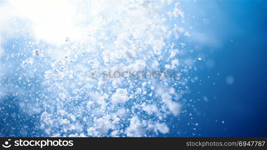Winter background. Falling snow in blue sky.. Winter background. Falling snow in blue sky