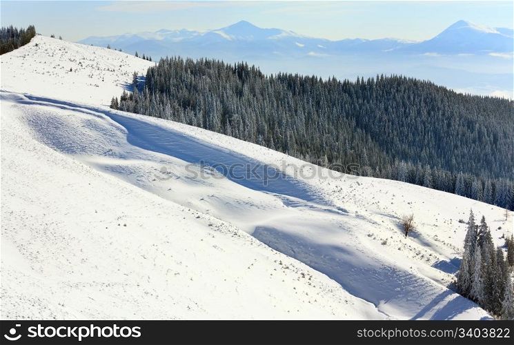 winter calm mountain landscape (view from Bukovel ski resort (Ukraine, Dovga mount) to Goverla)