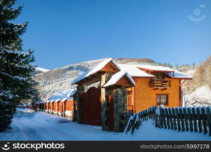 Winter camping in mountains, sunny frosty day