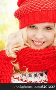 winter, christmas, xmas, x-mas, people, happiness concept - teenage girl in red hat and scarf