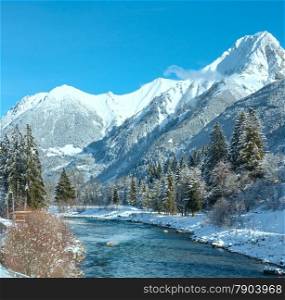 Winter country landscape with mountains and river (Austria, Tirol, Haselgehr village)