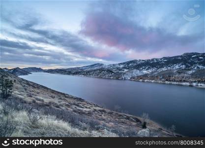 winter dawn over mountain lake - Horestooth Reservoir near Fort Collins in northern Colorado, winter scenery before sunrise