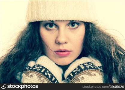 Winter fashion beautiful girl in warm clothing portrait vintage toned with retro instagram filter