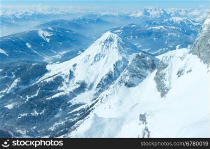 Winter hazy veiw from Dachstein mountain massif top to Schladming and Filzmoos region (Austria).
