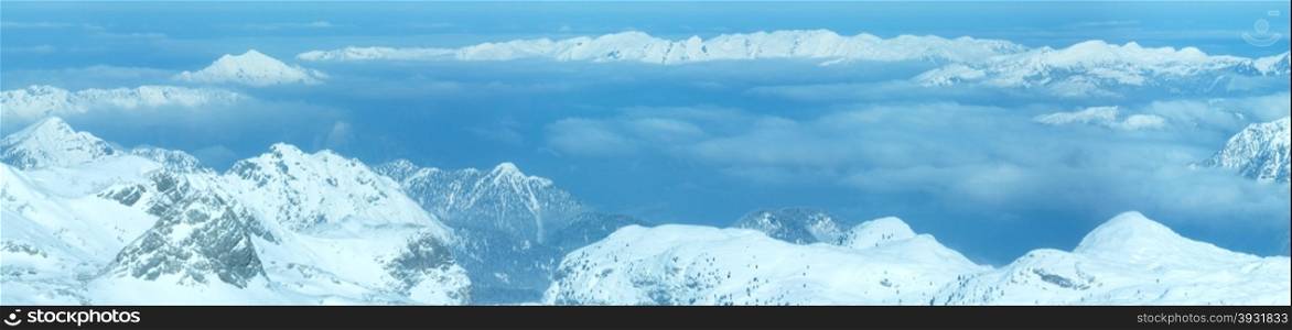 Winter hazy view from Dachstein mountain massif top (Austria).