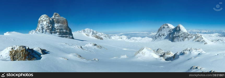 Winter hazy view from Dachstein mountain massif top (Austria).