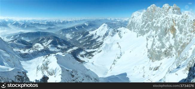 Winter hazy view from Dachstein mountain massif top to Schladming and Filzmoos region (Austria).