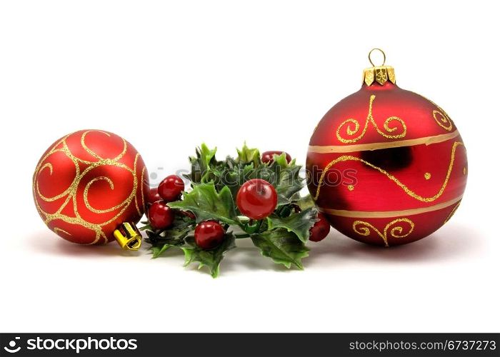 winter holiday decoration with christmas baubles and plant