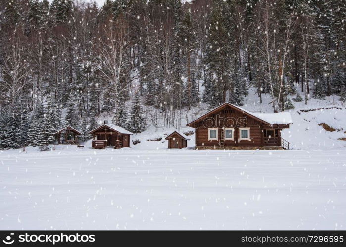 Winter holiday house in forest. Clean air, rest and relaxation. Unity with nature.. Winter holiday house in forest.