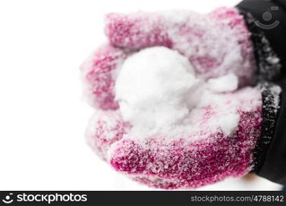 winter holidays, christmas and people concept - close up of woman holding snowball outdoors