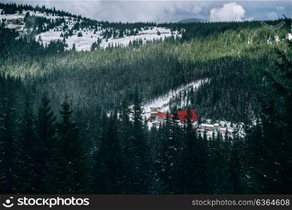 winter landscape in the Carpathian forest, mountains, clouds mist, trees