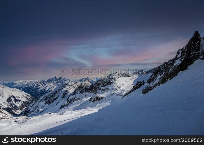 winter landscape with a colorful sunset