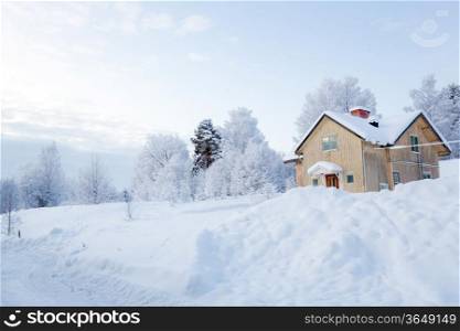 Winter landscape with house at Kiruna Sweden Lapland