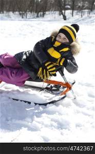 Winter little girl in rest snow park