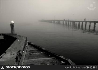 Winter Mist Over Still Water With Romantic Feel. Black and white image of Winter mist over the sea