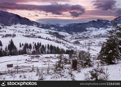 Winter mountain cloudy sunset. Carpathian mountains, Ukraine