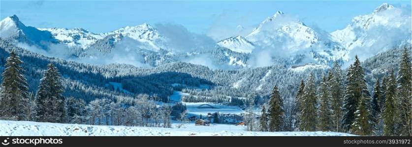 Winter mountain country panorama with fir forest (Heiterwang outskirts, Austria, Tirol)