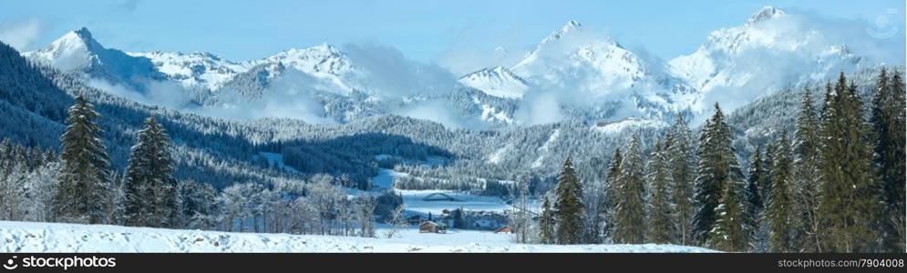 Winter mountain country panorama with fir forest (Heiterwang outskirts, Austria, Tirol)