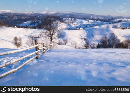Winter mountain hills at snowy morning