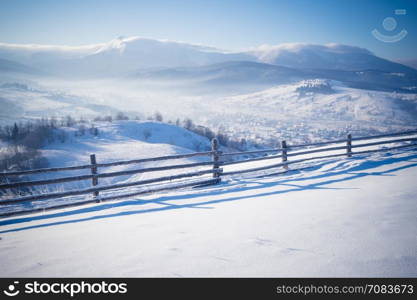 Winter mountain hills at sunny day