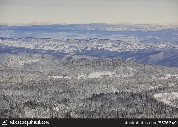 winter mountain landscape at sunny day and snow peaks