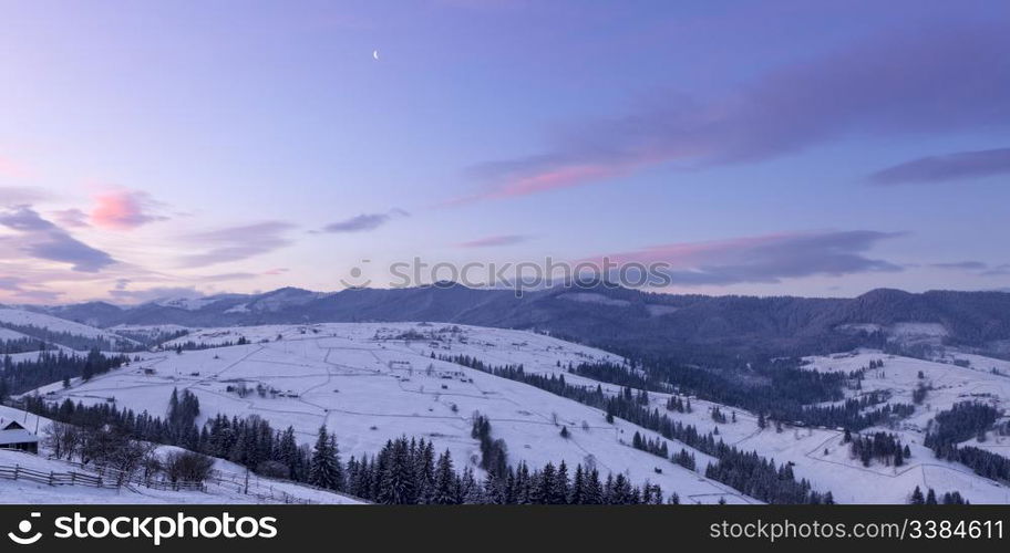 winter mountain landscape at sunrise. Sunrise in Carpathian Mountains, Ukraine