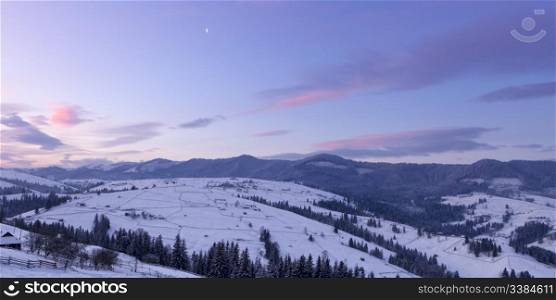 winter mountain landscape at sunrise. Sunrise in Carpathian Mountains, Ukraine