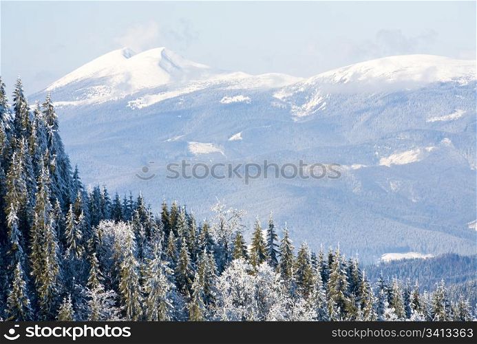 winter mountain landscape (view from Bukovel ski resort (Ukraine) to Syvulja mount)