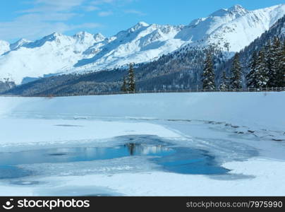 Winter mountain landscape with lake. Kappl ski region in the Tyrolean mountains, Austria.