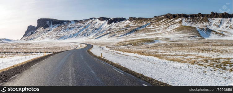 Winter Mountain range road in a sunny day at Vik, Southern of Iceland