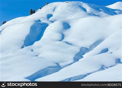 Winter mountain slope with snowdrift covered (Austria).